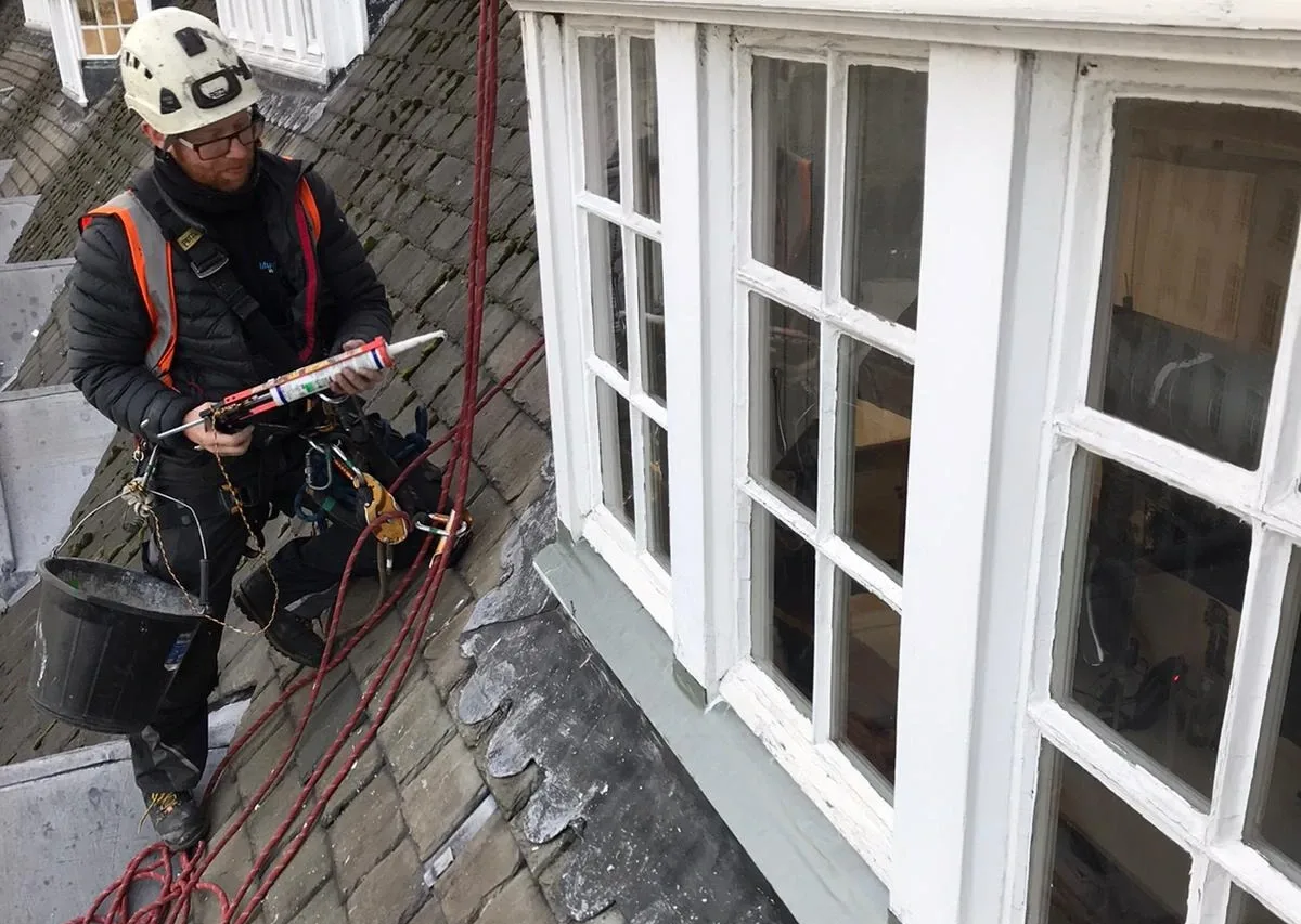 High-quality industrial roofing installation on a large commercial building, ensuring durability and weather resistance.