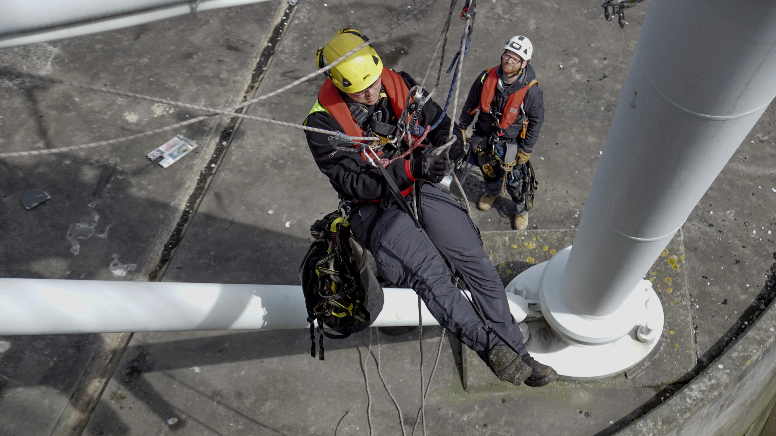 Rope access technicians providing specialist services on a high rise building in London for maintenance inspection and repairs